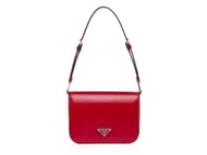 Best red handbags to gift her this Valentine's Day- Prada Brushed Leather Shoulder Bag - $4,099.426 (Image via Saks Fifth Avenue )